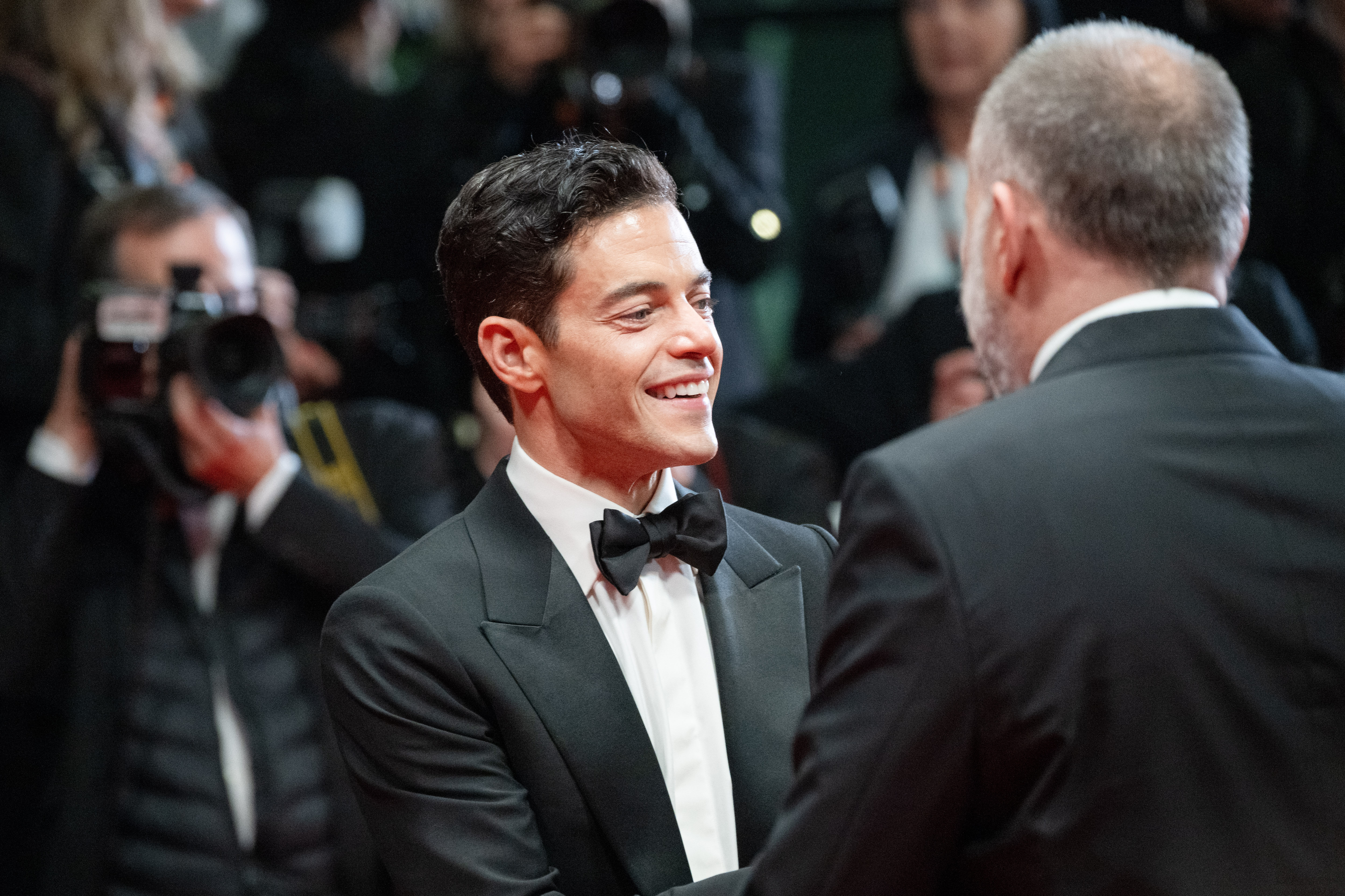 Image Description: Rami Malek and Ira Sachs attend the competition screening red carpet of the movie The Man I Love during the 79th Cannes Film Festival Cannes France 2026-05-20