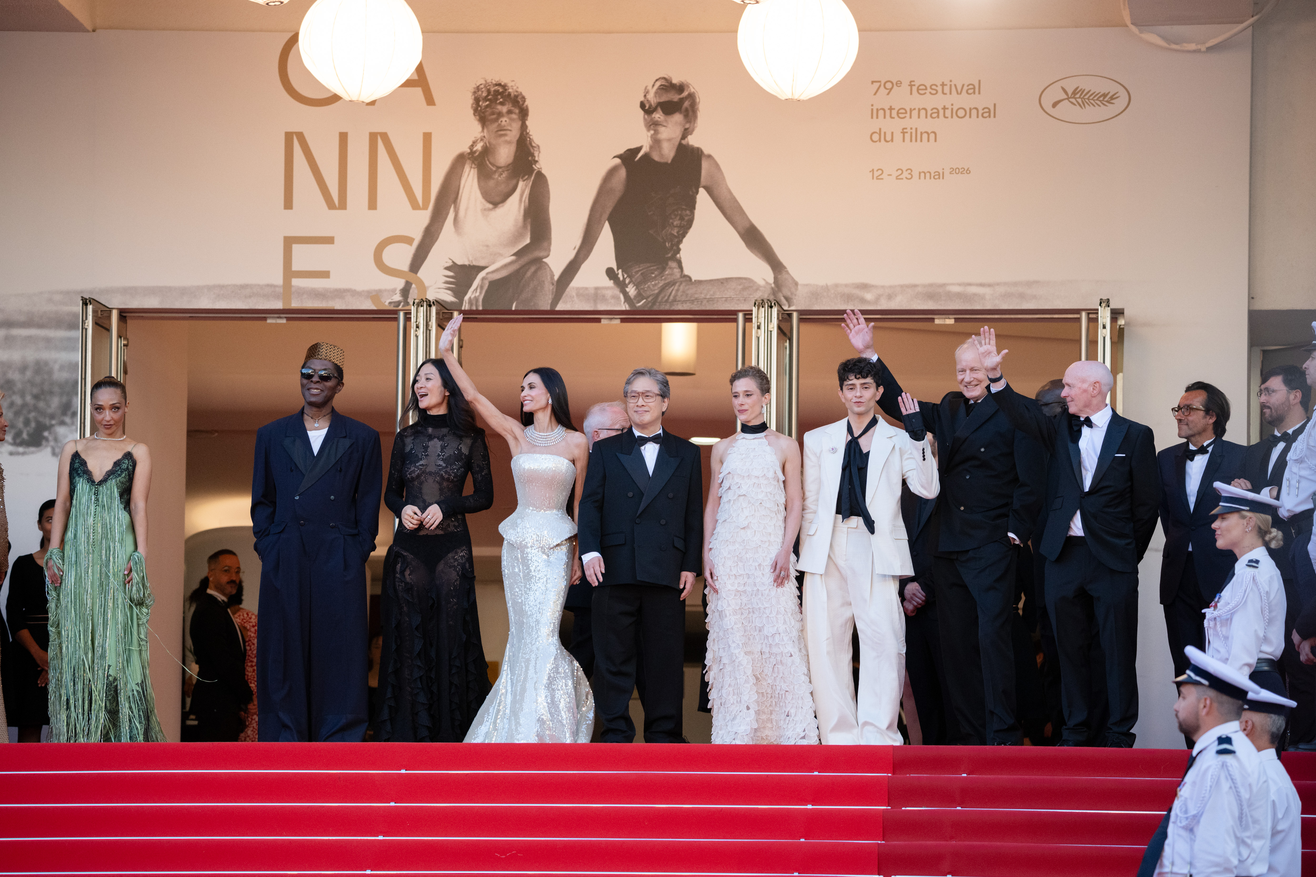 Image Description: Jury Members Ruth Negga Isaach de Bankole Chloe Zhao Demi Moore Jury President Park Chan-wook Laura Wandel Diego Cespedes Stellan Skarsgard and Paul Laverty attend the opening ceremony red carpet of the movie La Venus Electrique during the 79th Cannes F