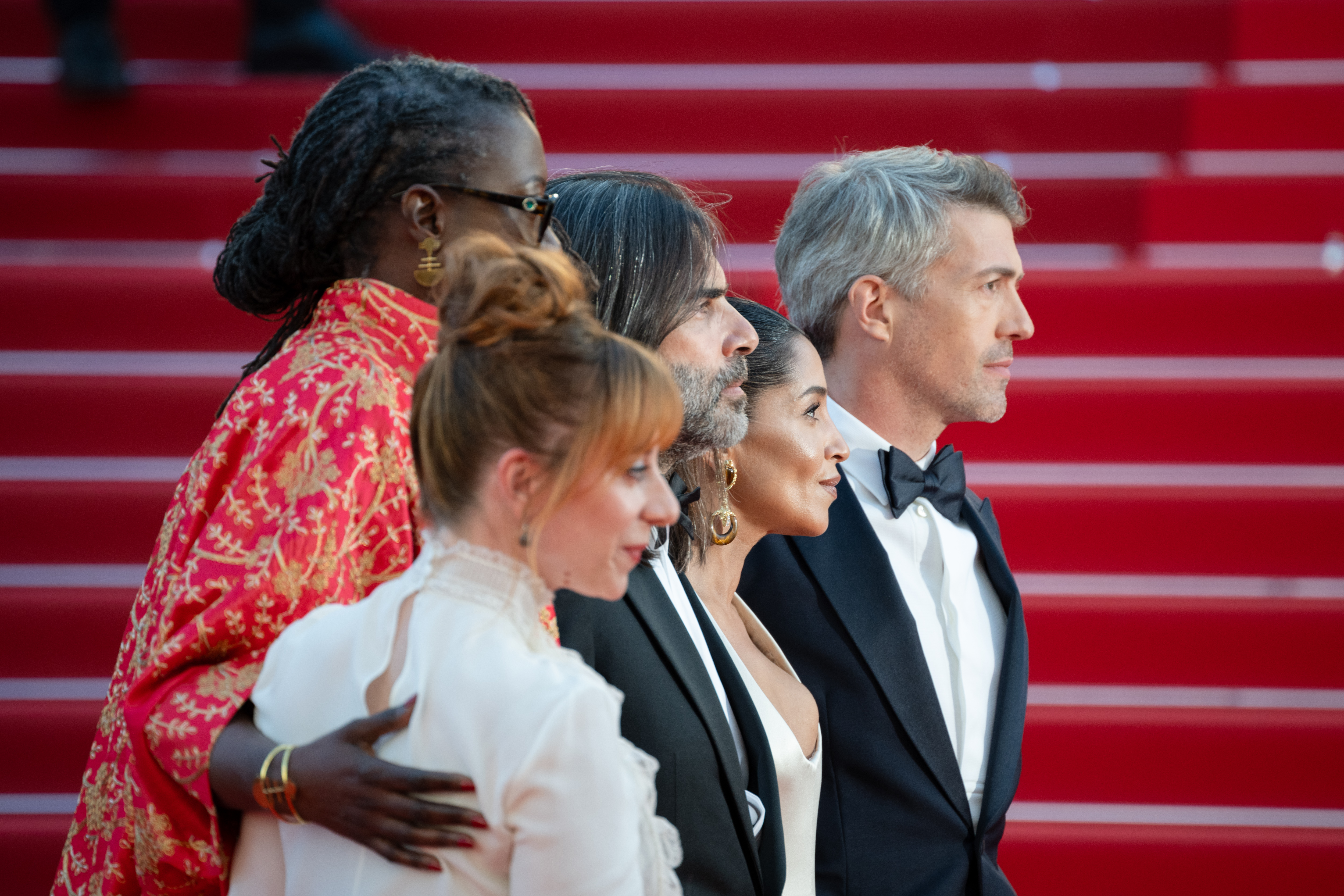 Image Description: Un Certain Regard Jury Members Laura Samani Un Certain Regard Jury Members Angele Diabang Khaled Mouzanar Un Certain Regard Jury President Leila Bekhti and Thomas Cailley attend the competition screening red carpet of the movie La Vie d'une Femme during th