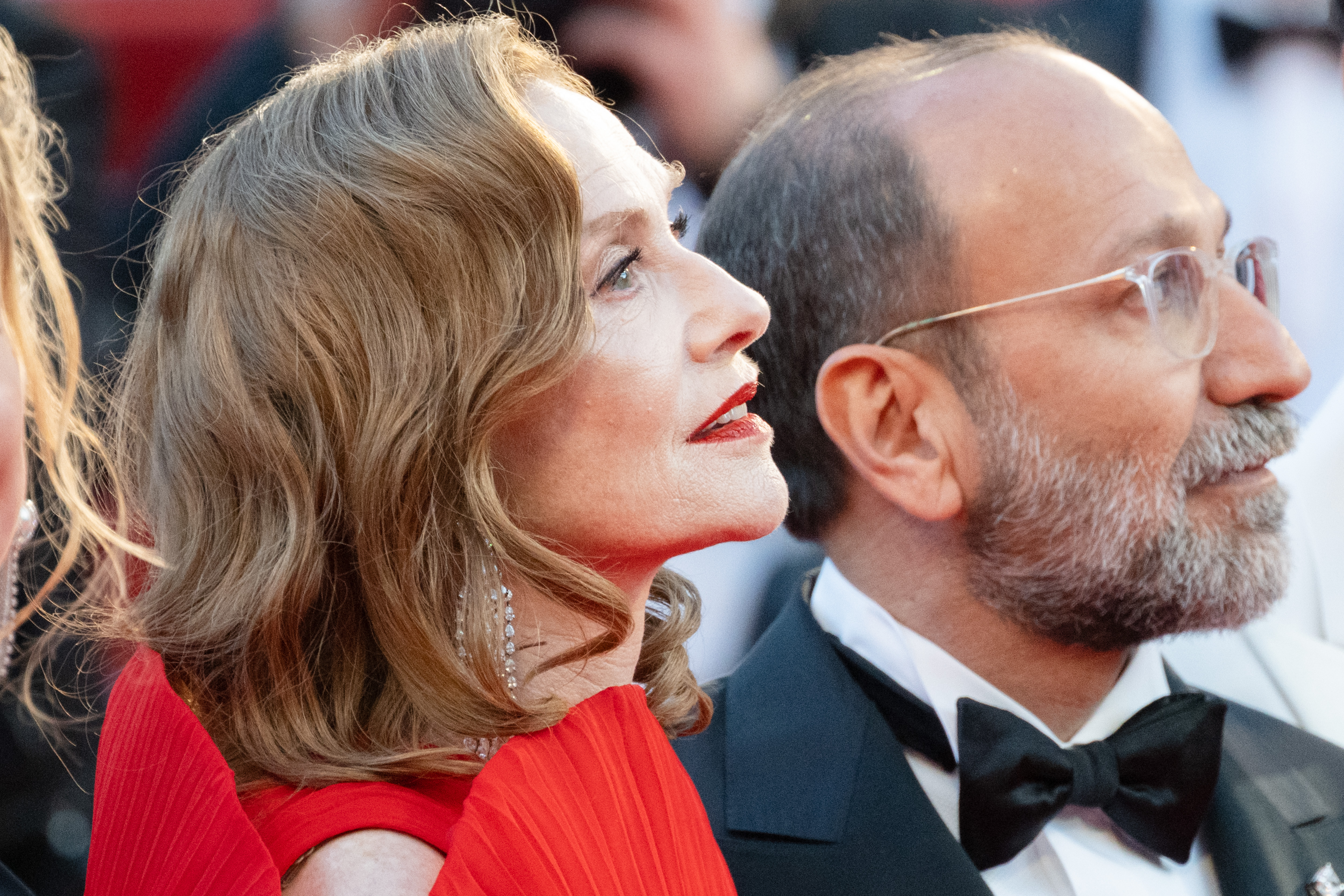 Image Description: Isabelle Huppert and Asghar Farhadi attend the competition screening red carpet of the movie Histoires Paralleles during the 79th Cannes Film Festival Cannes France 2026-05-14