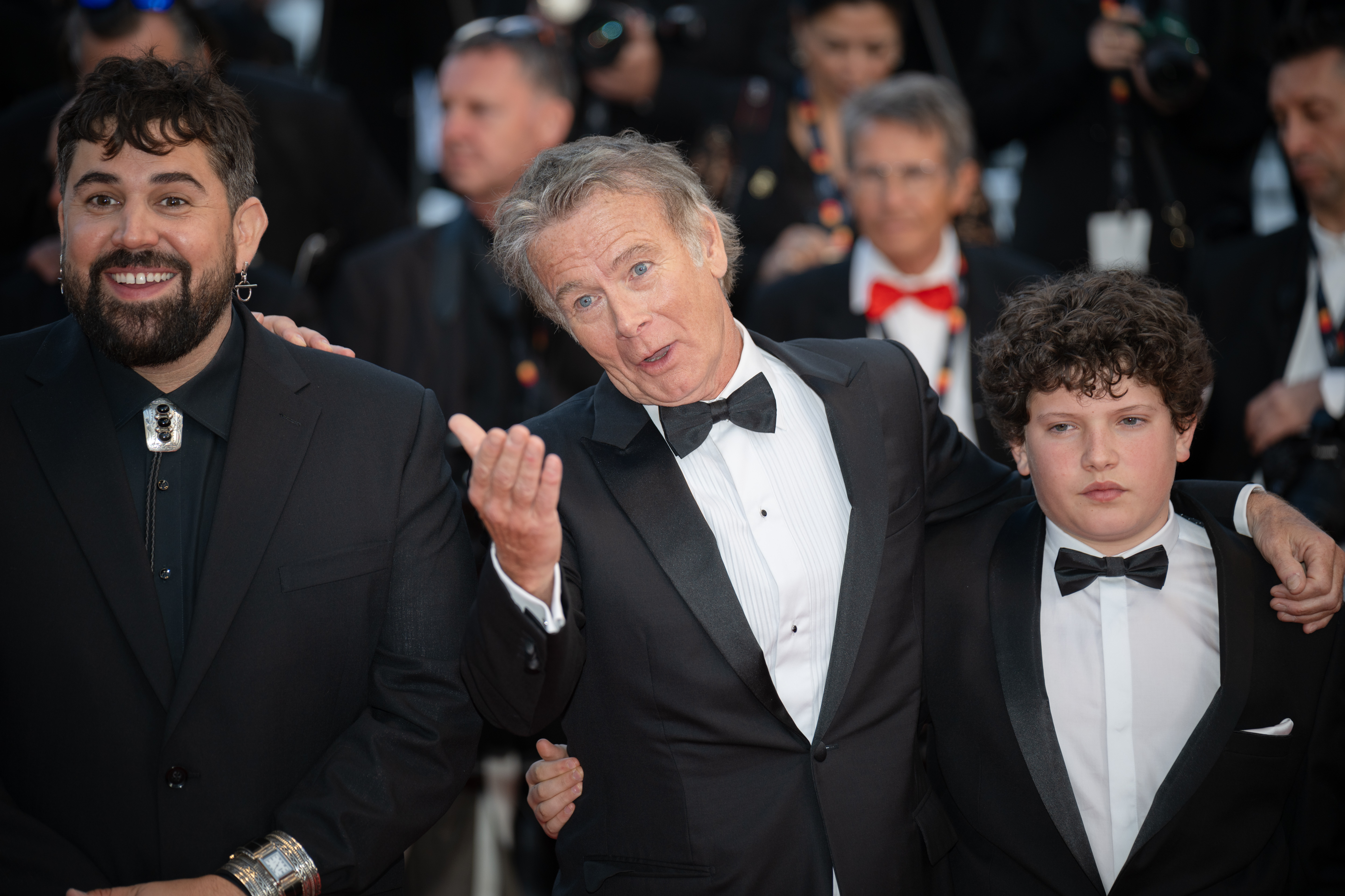 Image Description: Artus Solar Franck Dubosc and guest attend the competition screening red carpet of the movie Histoires Paralleles during the 79th Cannes Film Festival Cannes France 2026-05-14