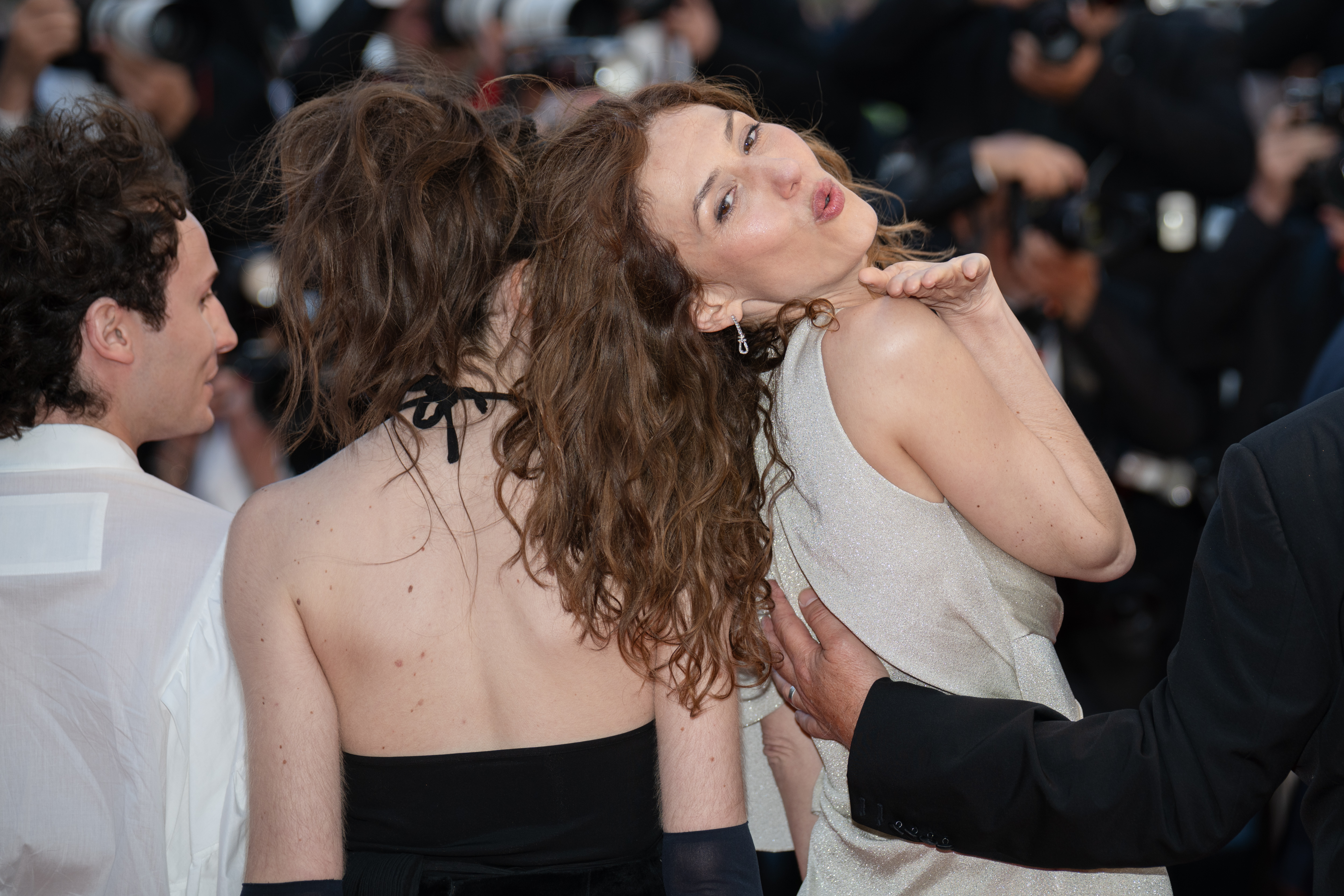 Image Description: Nemo Schiffman Suzanne de Baecque and Doria Tillier attend the competition screening red carpet of the movie Histoires Paralleles during the 79th Cannes Film Festival Cannes France 2026-05-14
