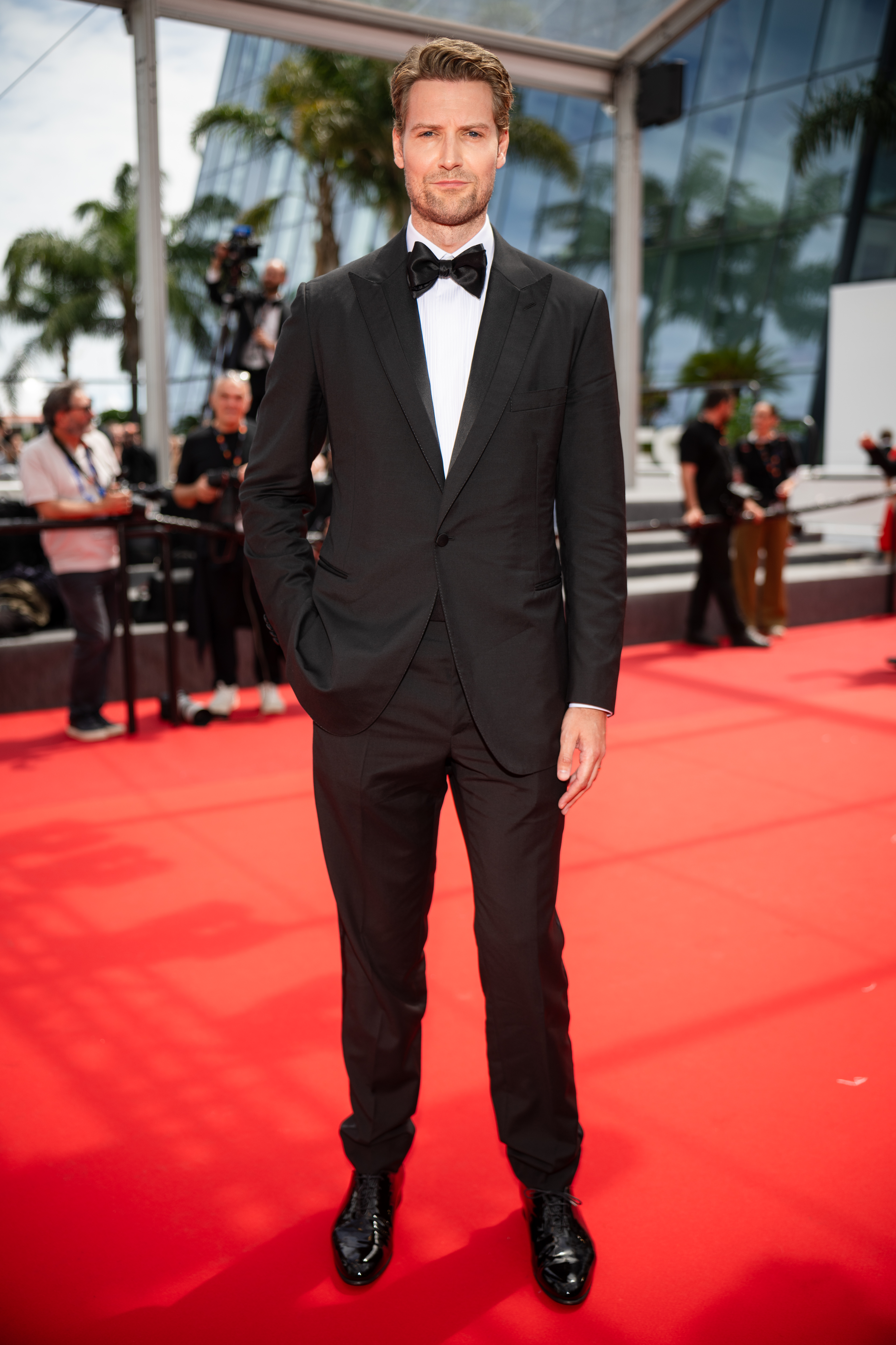 Image Description: Alexander Johnson attends the competition screening red carpet of the movie Minotaur during the 79th Cannes Film Festival Cannes France 2026-05-19
