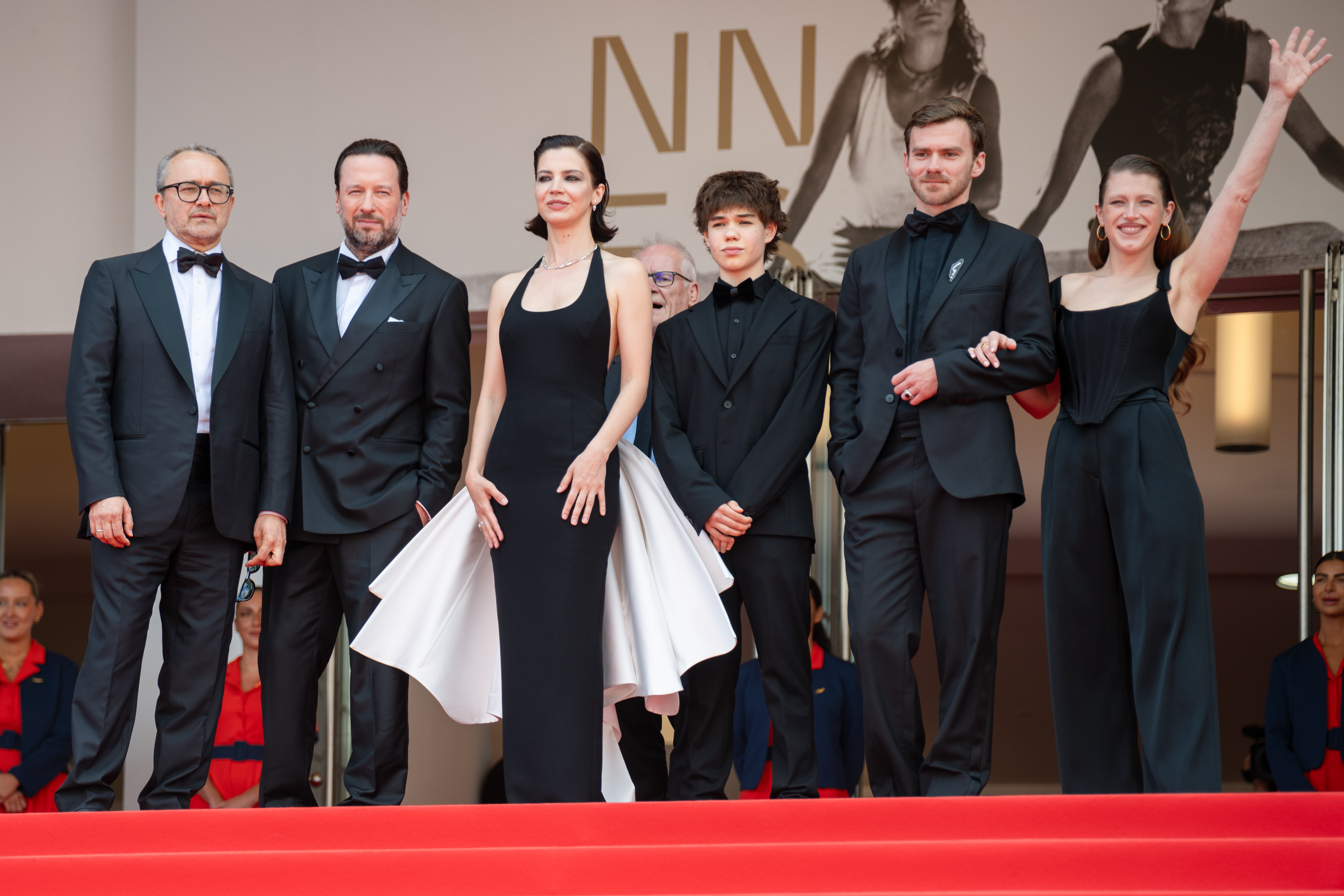 Image Description: Andrey Zvyagintsev Dmitriy Mazurov Iris Lebedeva Boris Kudrin Yuriy Zavalnyouk and Varvara Shmykova attend the competition screening red carpet of the movie Minotaur during the 79th Cannes Film Festival Cannes France 2026-05-19