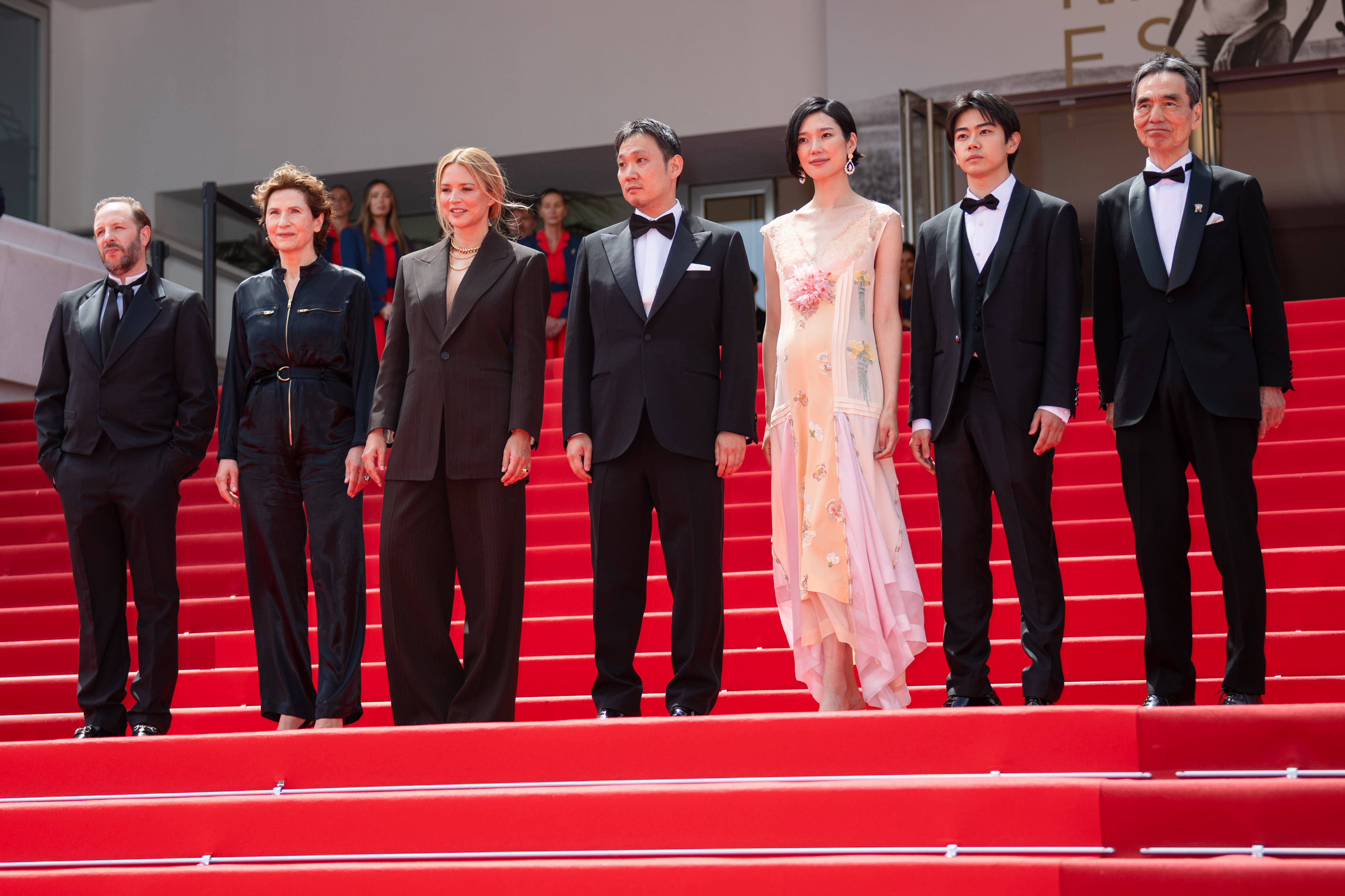 Image Description: Jean-Charles Clichet Marie Bunel Virginie Efira Ryusuke Hamaguchi Tao Okamoto Kodai Kurosaki and Kyozo Nagatsuka attend the competition screening red carpet of the movie Soudain during the 79th Cannes Film Festival Cannes France 2026-05-15