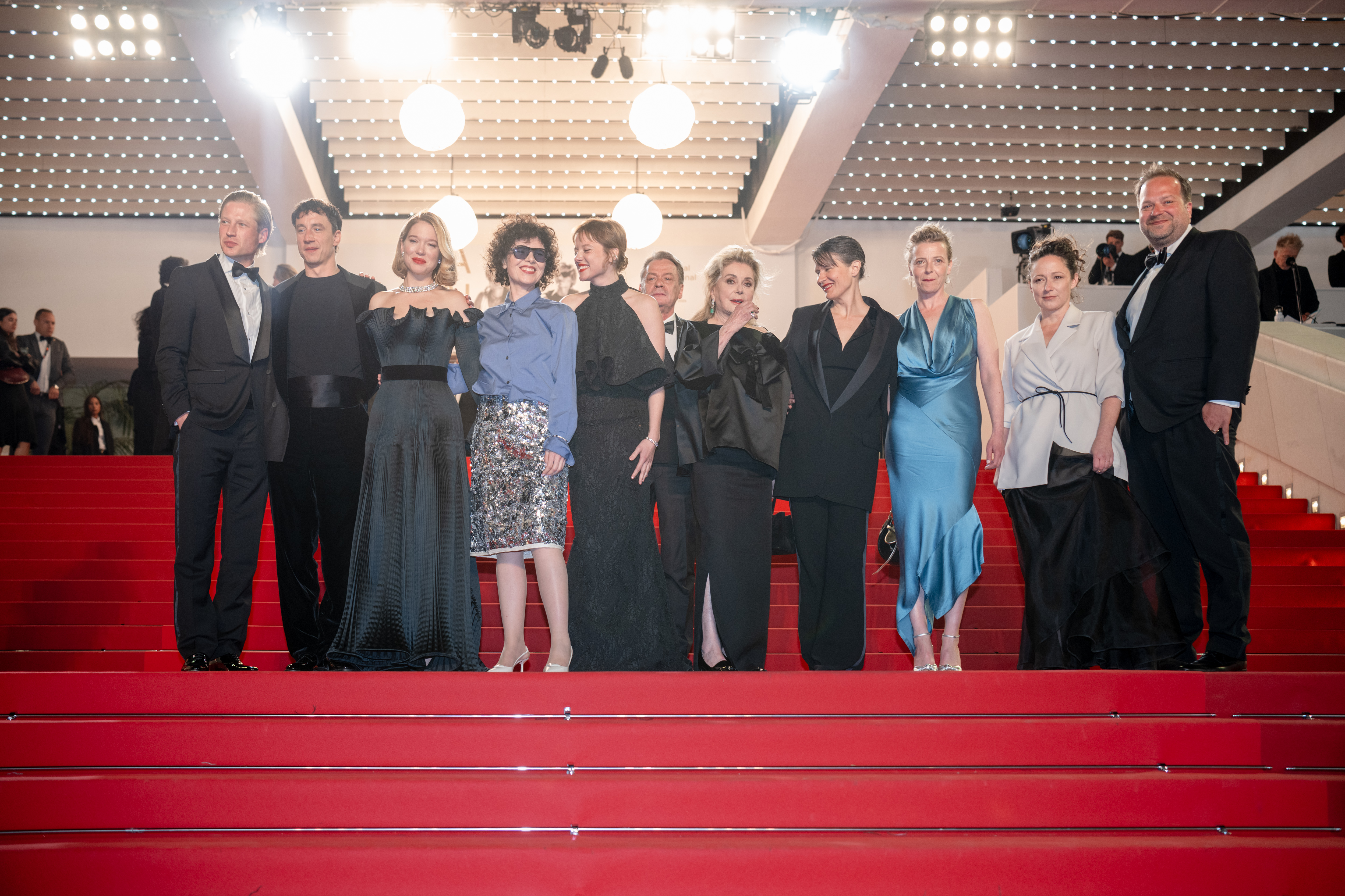 Image Description: Anton Rubtsov Laurence Rupp Lea Seydoux Marie Kreutzer Jella Haase Catherine Deneuve Camille Dalmais Patrycia Ziolkowska Johanna Scherz and Alexander Glehr attend the competition screening red carpet of the movie Gentle Monster during the 79th Cannes Film