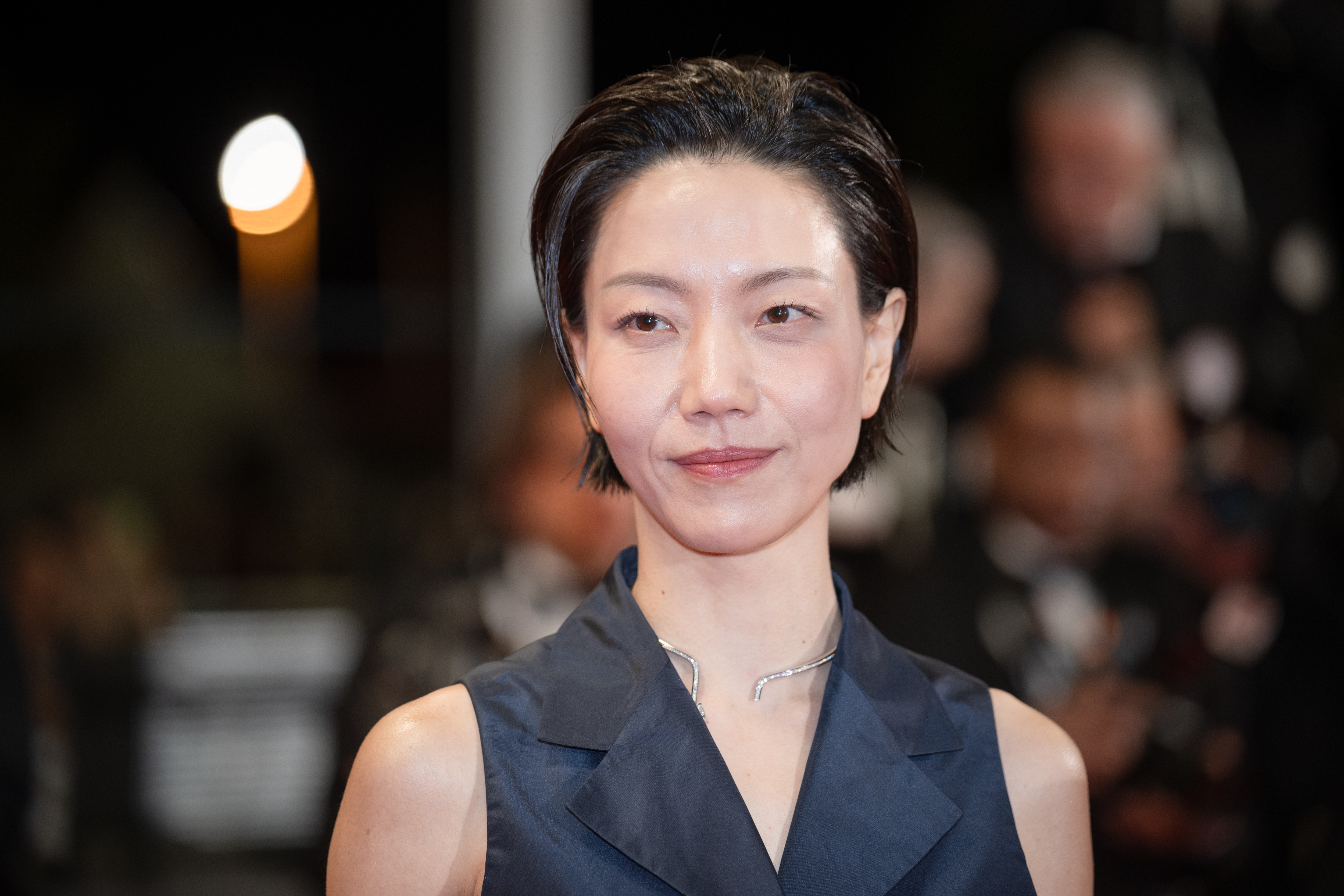 Image Description: Kim Shin-rok attends the midnight screening of the movie Gun-Che during the 79th Cannes Film Festival Cannes France 2026-05-15