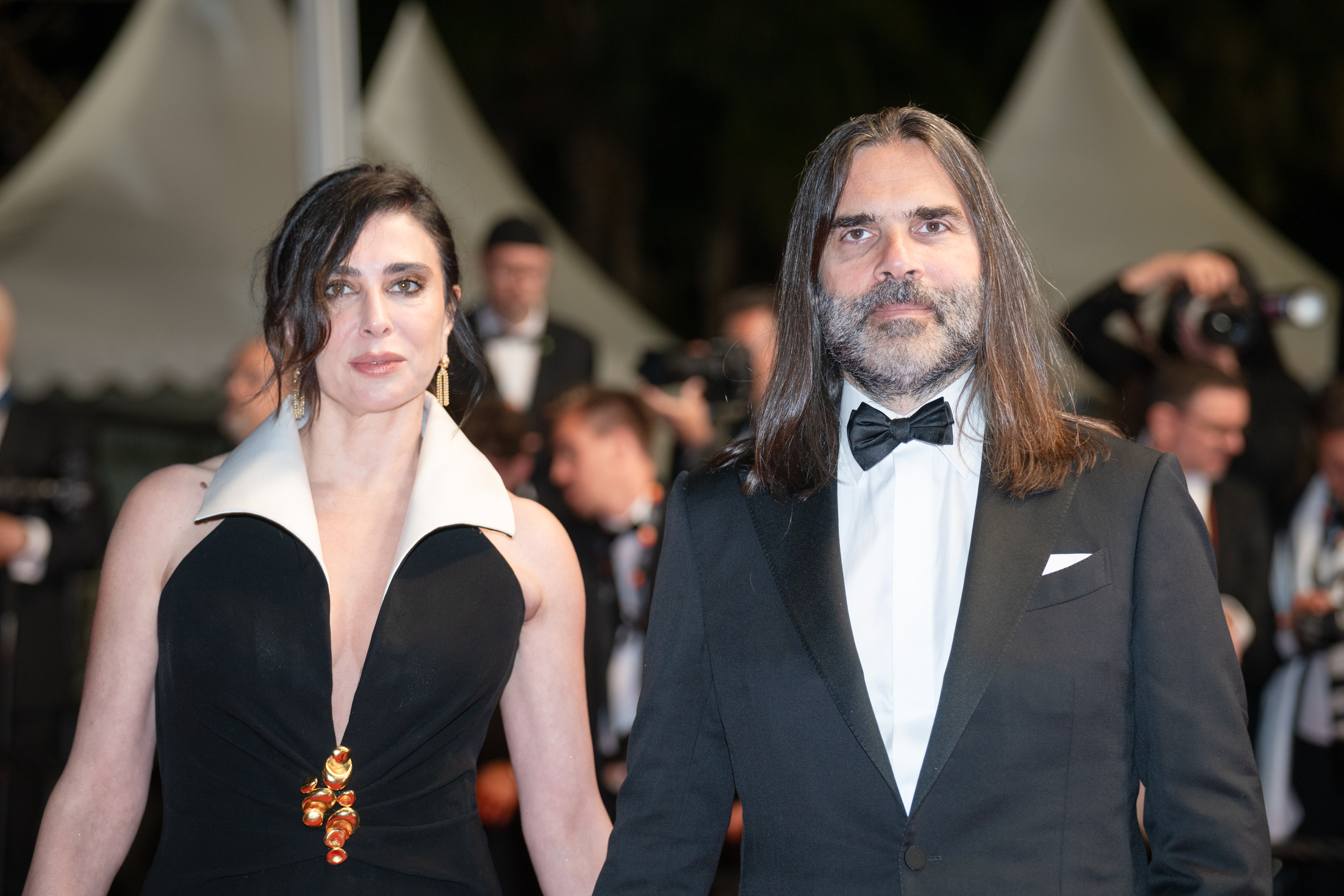 Image Description: Khaled Mouzanar - R - attend the competition screening red carpet of the movie The Man I Love during the 79th Cannes Film Festival Cannes France 2026-05-20