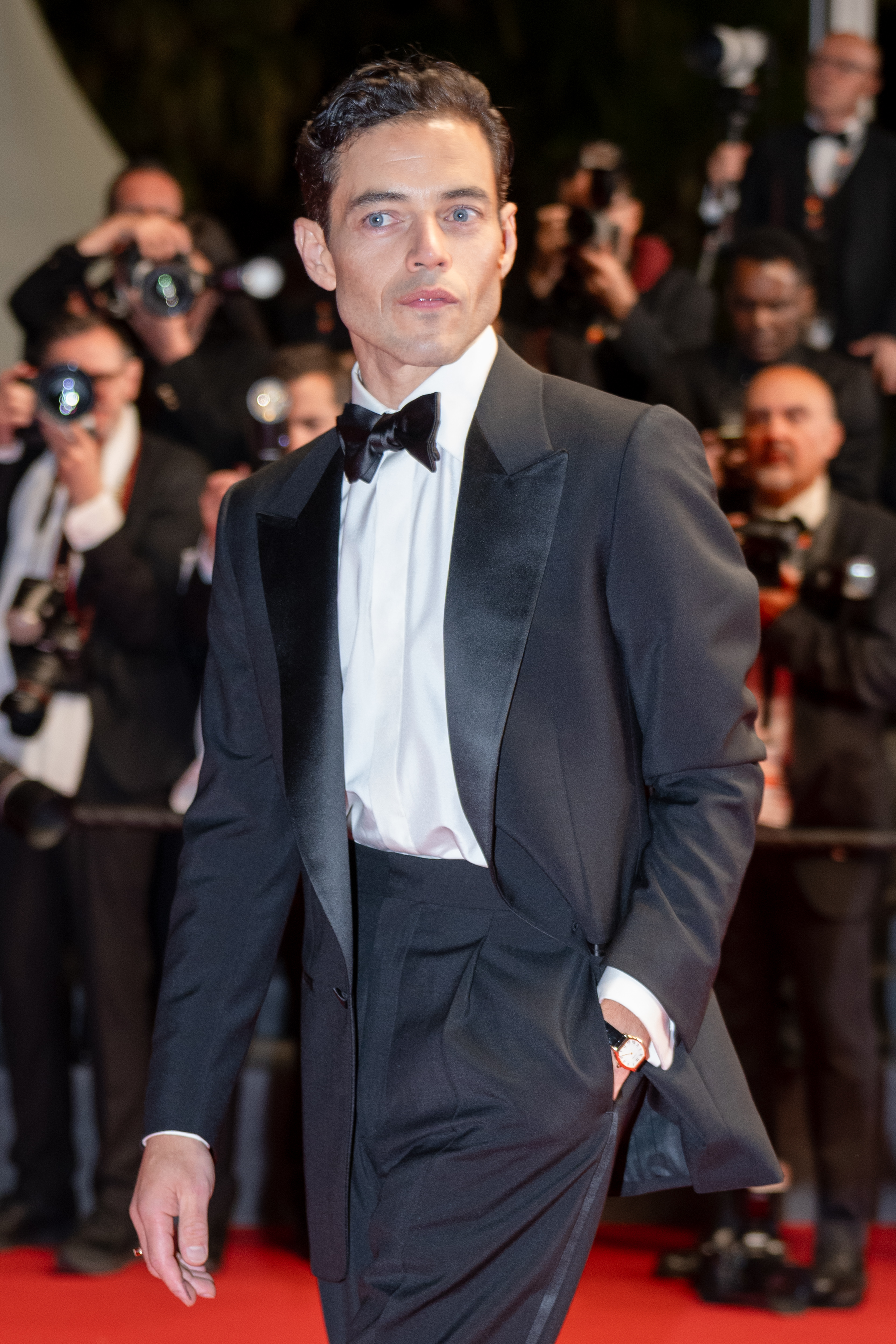 Image Description: Rami Malek attends the competition screening red carpet of the movie The Man I Love during the 79th Cannes Film Festival Cannes France 2026-05-20