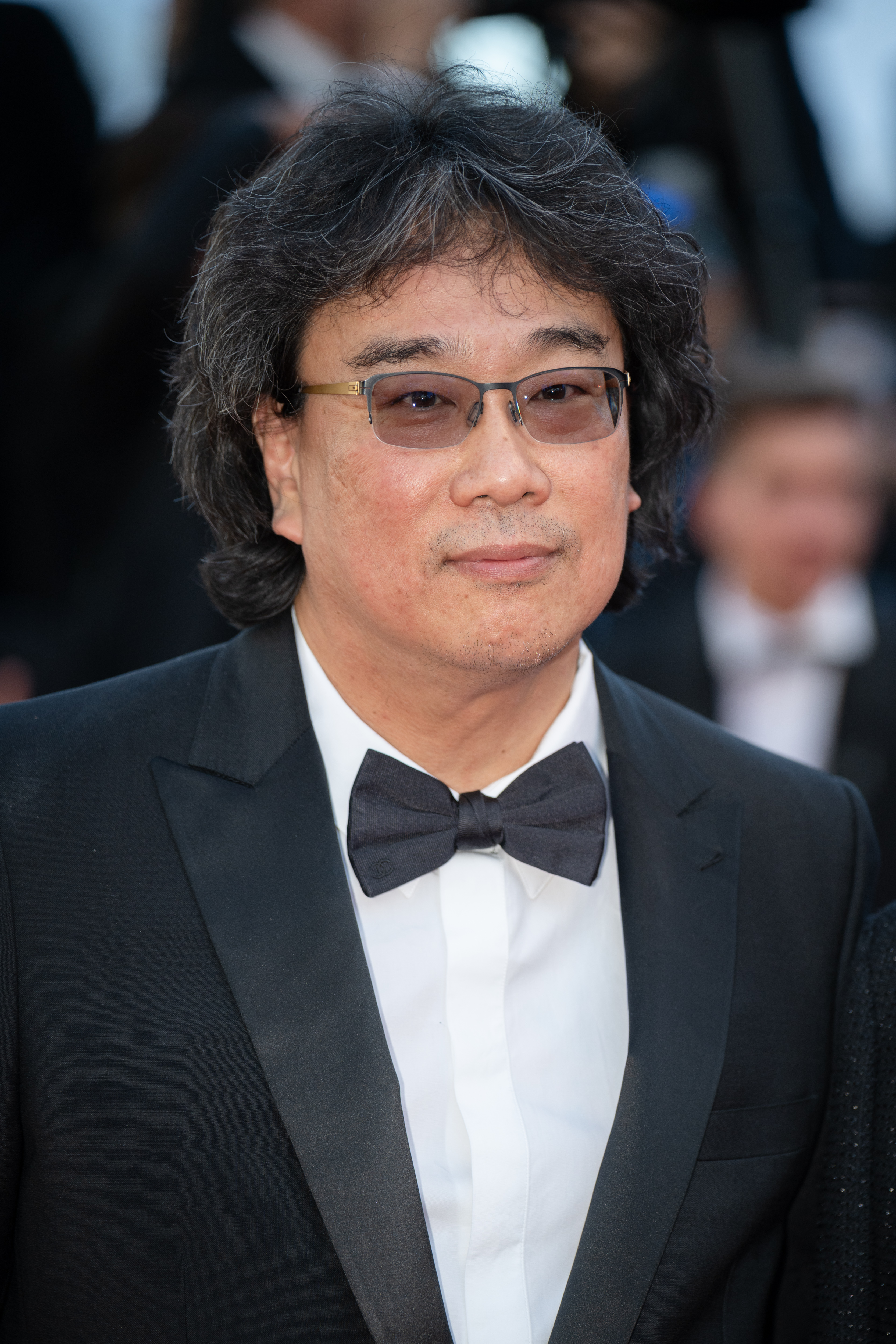 Image Description: Bong Joon-ho attends the opening ceremony red carpet of the movie La Venus Electrique during the 79th Cannes Film Festival Cannes France 2026-05-12