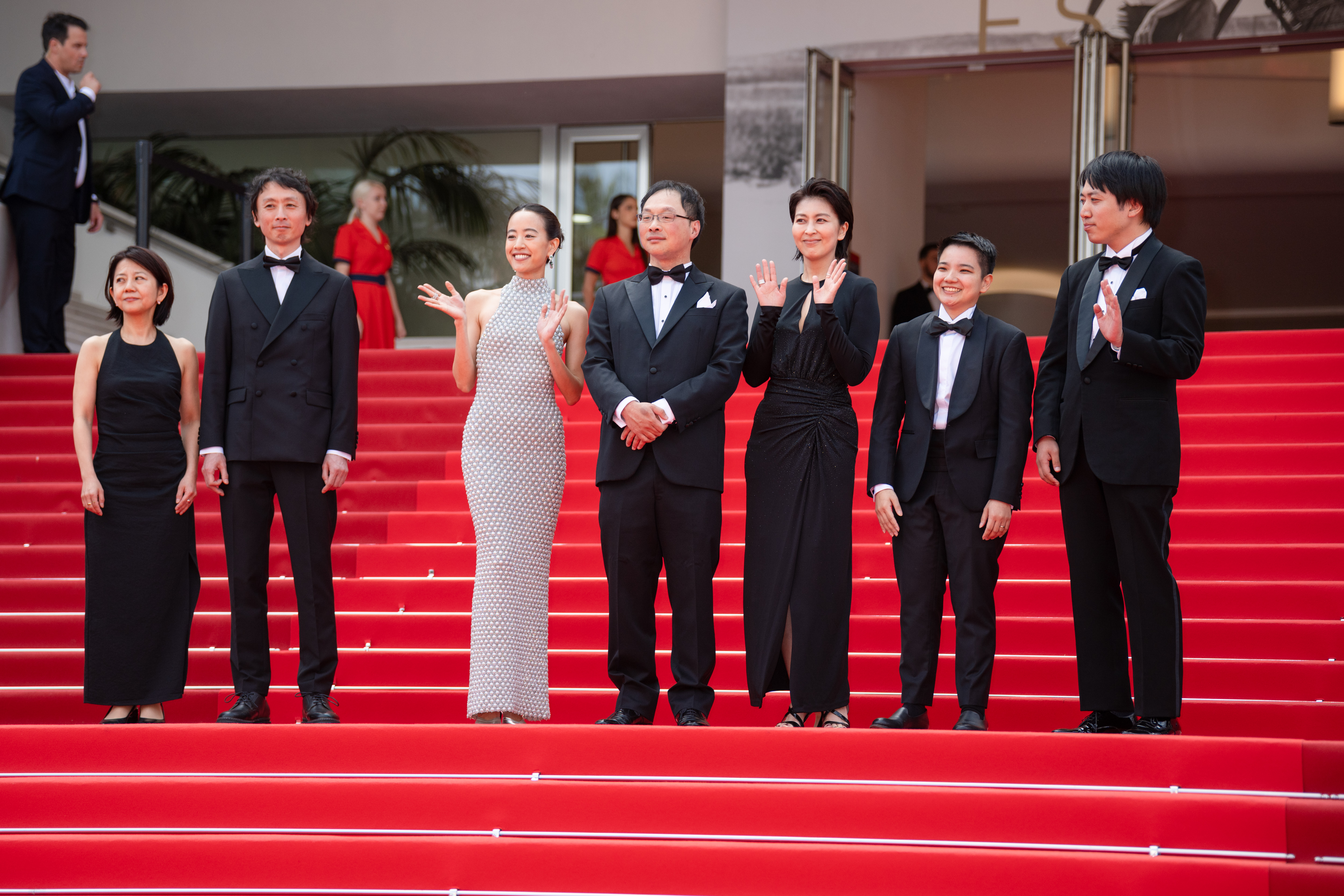 Image Description: A guest Terutaro Osanai Shizuka Ishibaschi Koji Fukada Takako Matsu Tan Si En and a guest attend the competition screening red carpet of the movie Nagi Notes during the 79th Cannes Film Festival Cannes France 2026-05-13