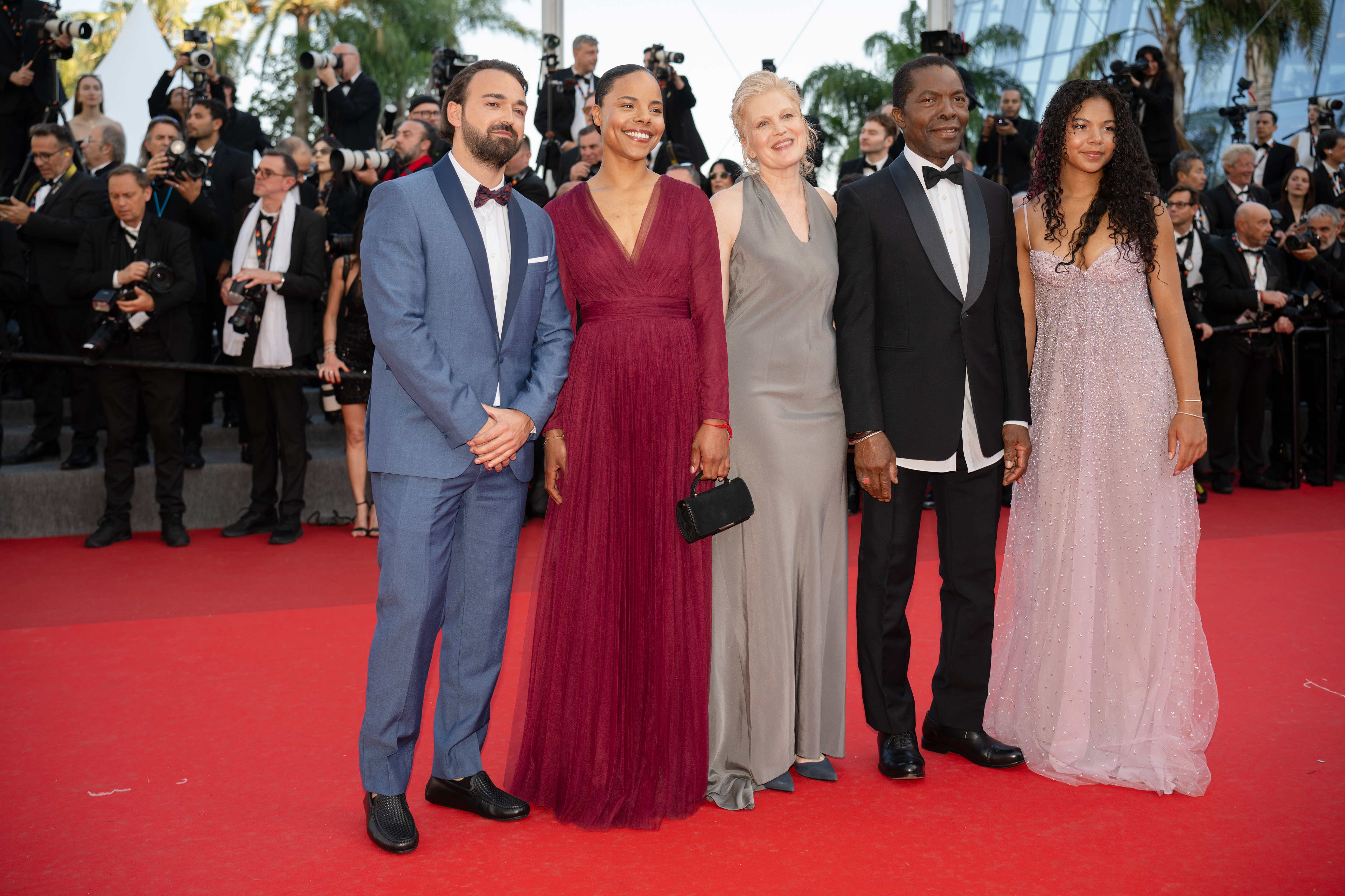 Image Description: A guest Aisha de Bankole a guest Isaac de bankole and Shade de Bankole attend the competition screening red carpet of the movie Histoires de la Nuit during the 79th Cannes Film Festival Cannes France 2026-05-22