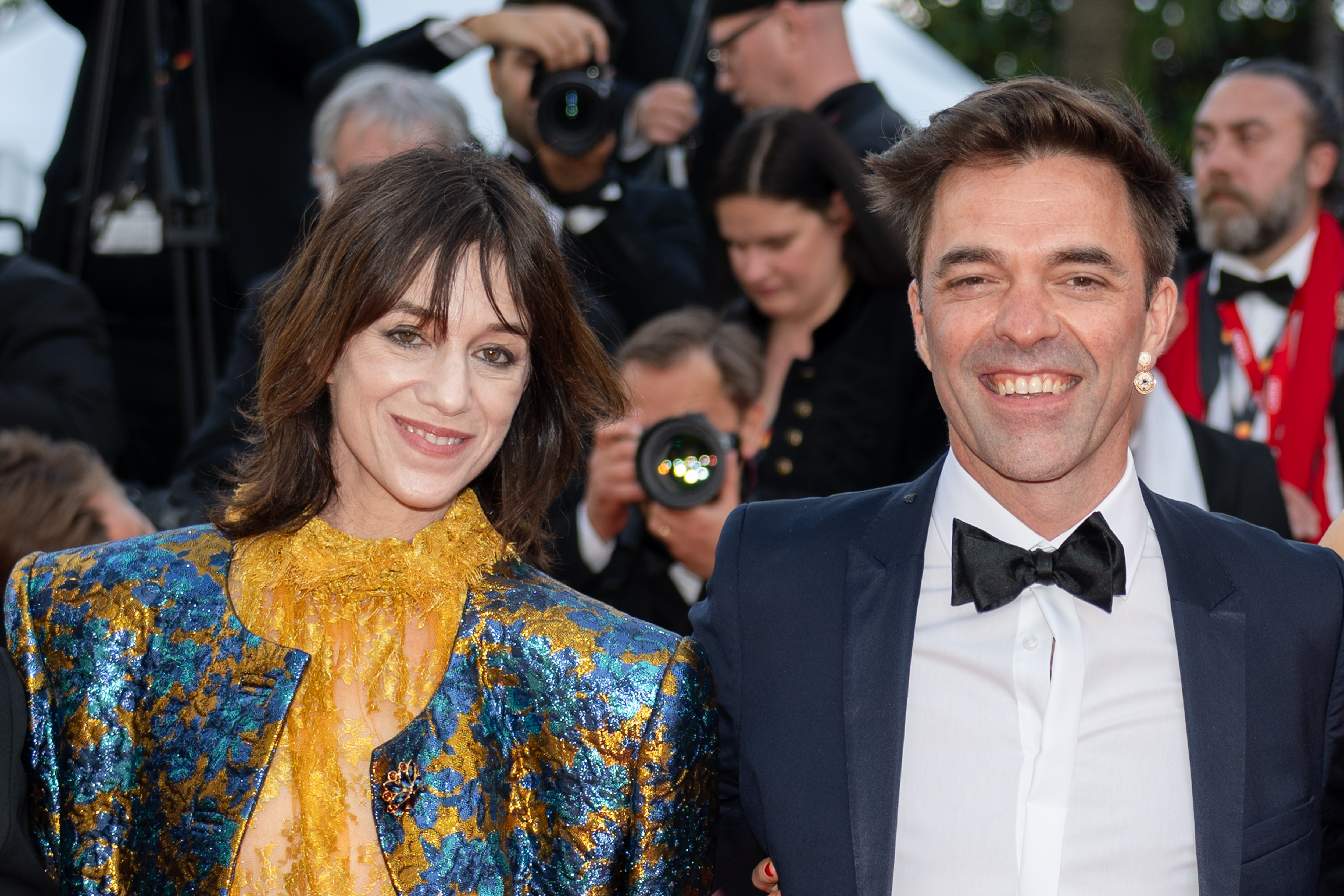 Image Description: Charlotte Gainsbourg and Yvo Muller attend the competition screening red carpet of the movie Fjord during the 79th Cannes Film Festival Cannes France 2026-05-18