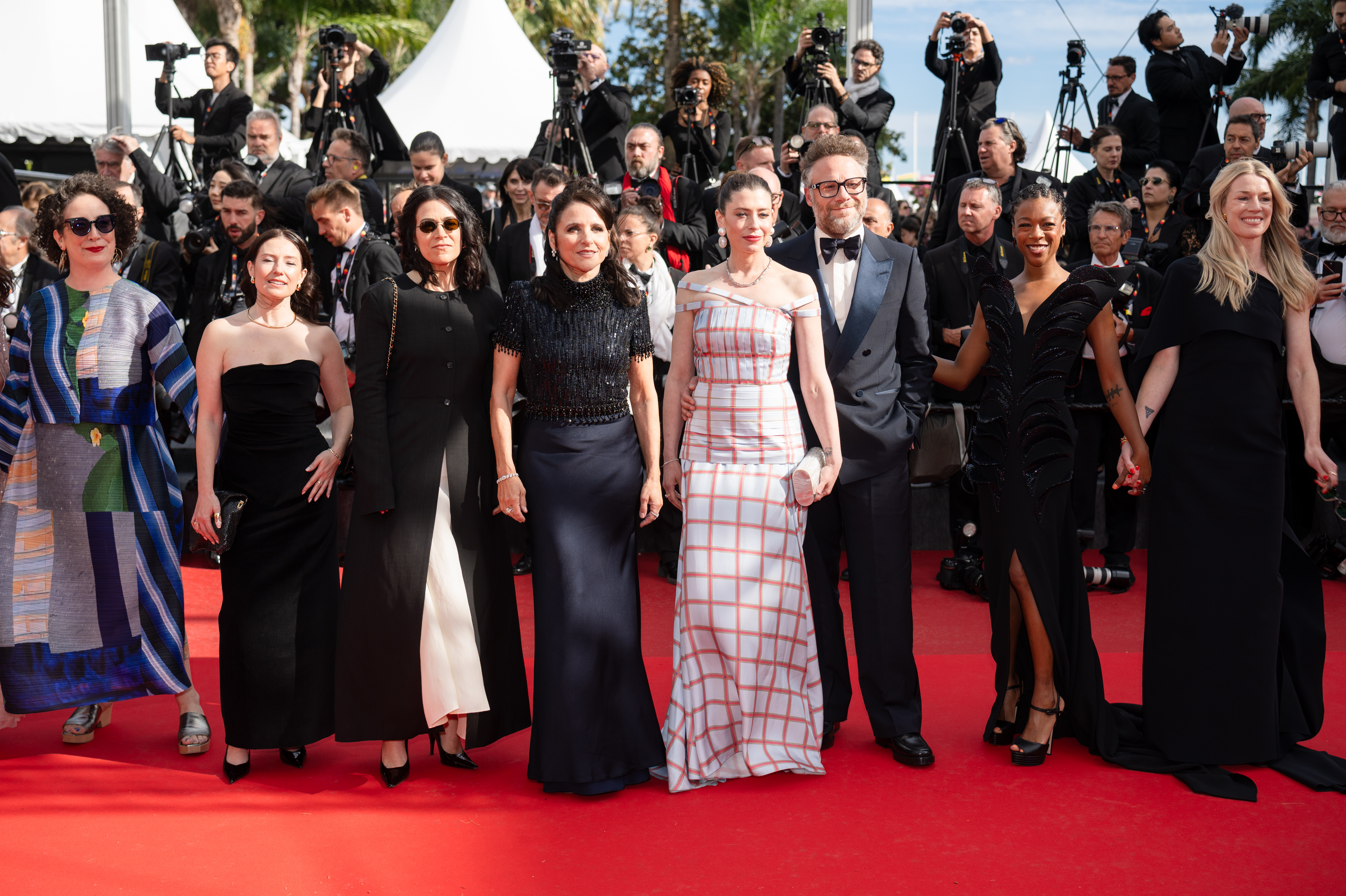Image Description: Sugar Lyn Beard Abbi Jacobson Julia Louis-Dreyfus Lauren Miller Rogen Seth Rogen Samira Wiley Freddie Williams II and Leah Nelson attend the competition screening red carpet of the movie Fatherland during the 79th Cannes Film Festival Cannes France 2026-05