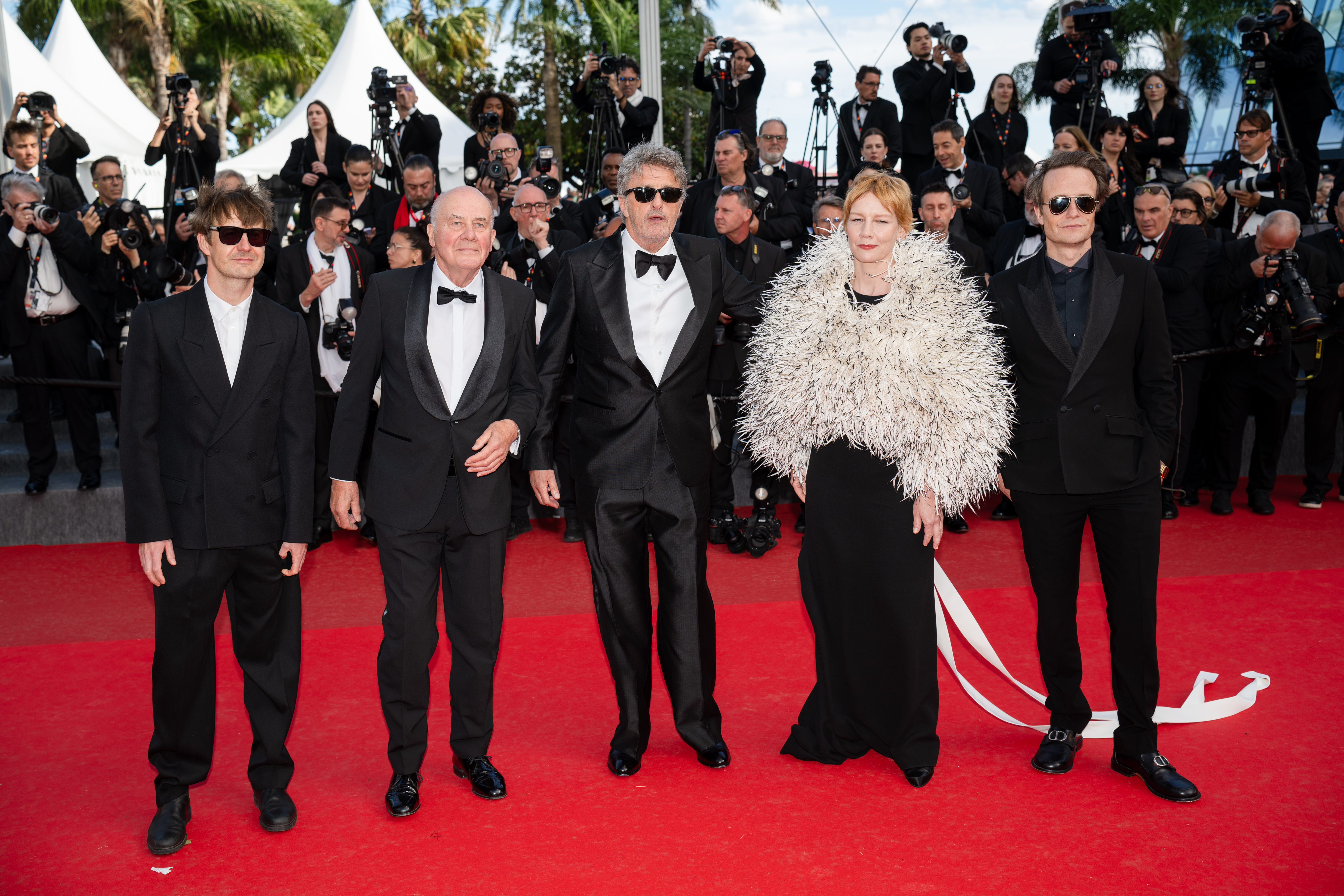Image Description: Lukasz Zal Hanns Zischler Pawel Pawlikowski Sandra Huller and August Diehl attend the competition screening red carpet of the movie Fatherland during the 79th Cannes Film Festival Cannes France 2026-05-14